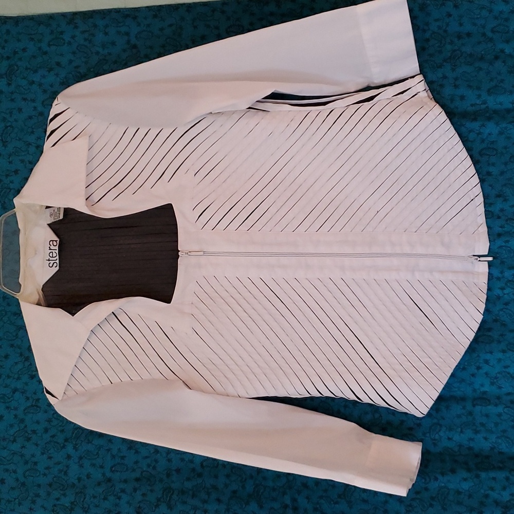 White, zip front blouse.